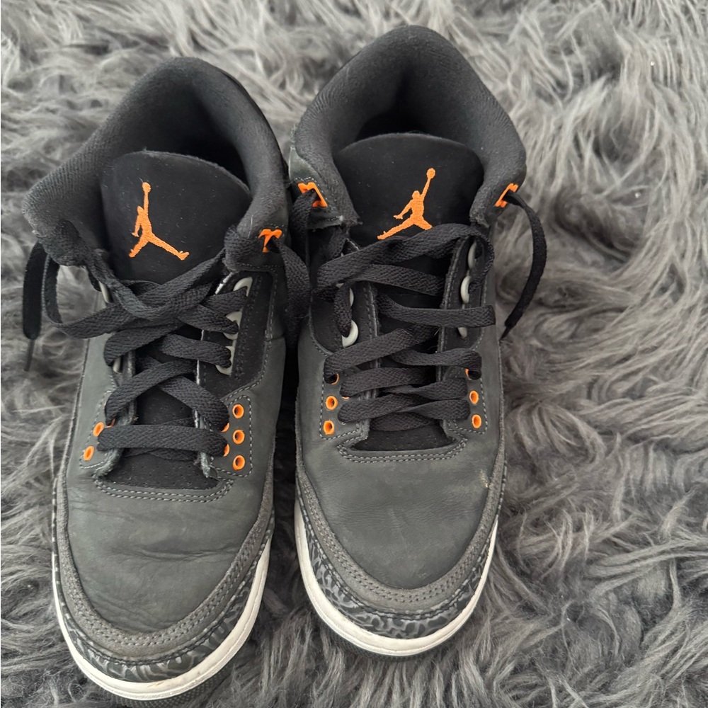 Jordan grade school Black Sneakers with Orange Highlights